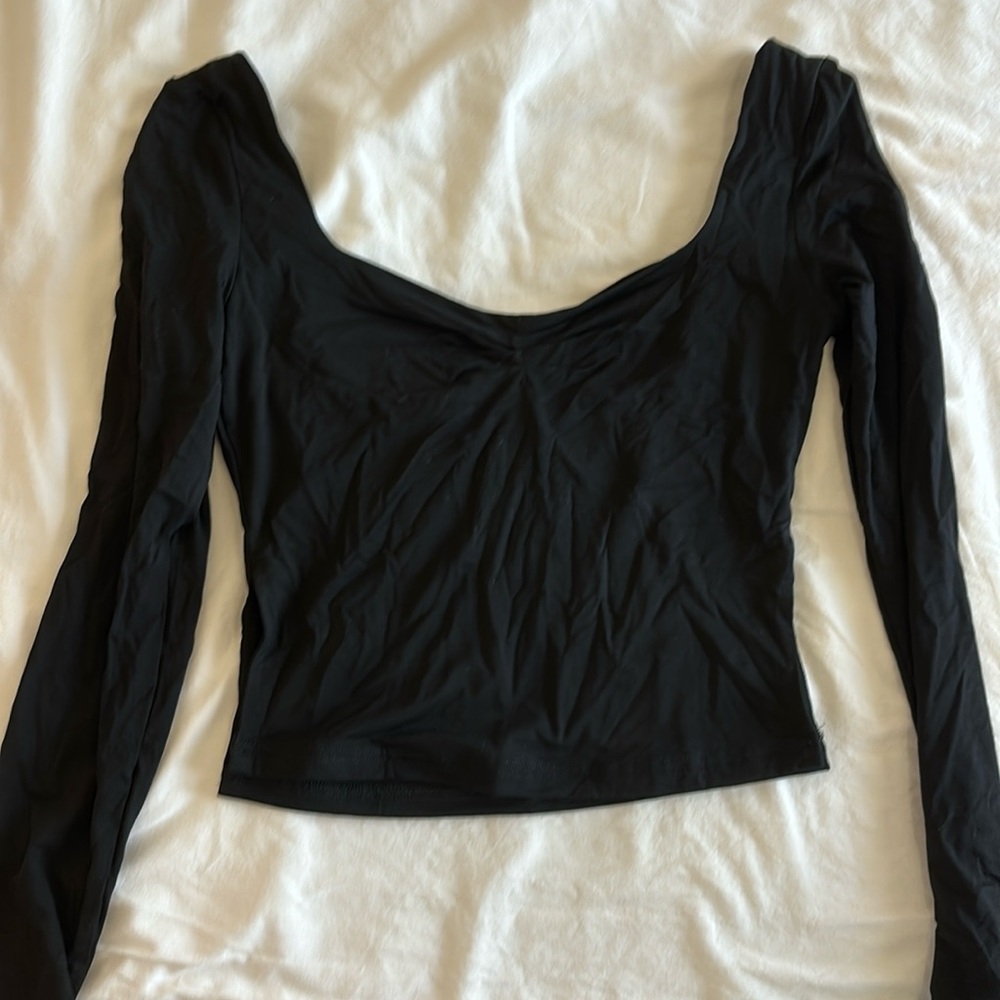 black going out top with small ruched front detail